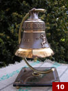 A commemorative bell with an ornamented crest of Gdansk and Neptun`s statue (h. 10cm, d. 10,5cm)